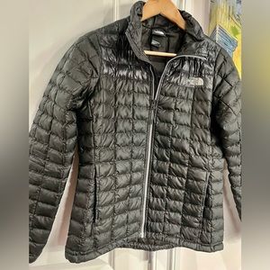 The North Face black puffer jacket